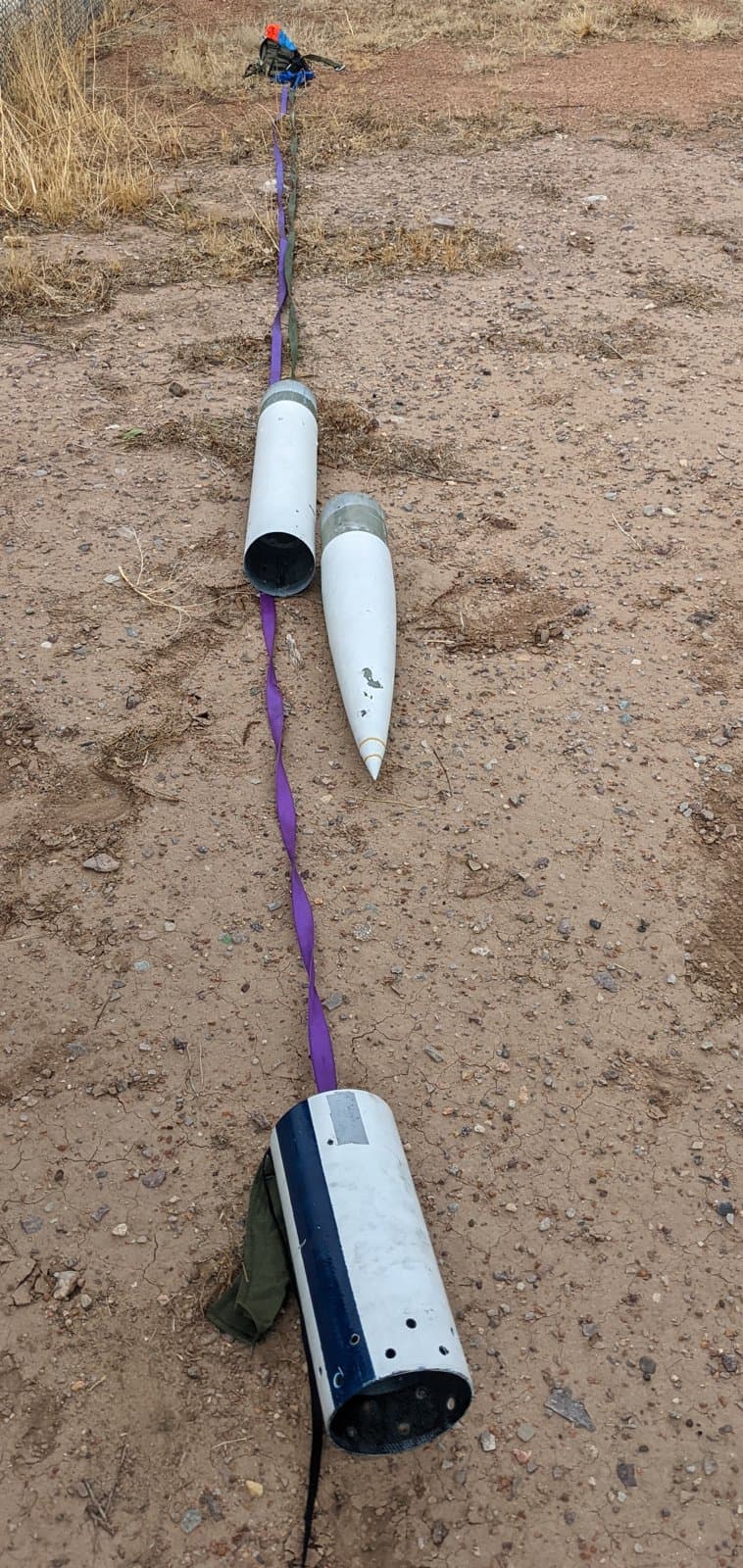 Rocket recovery components laid out on the ground